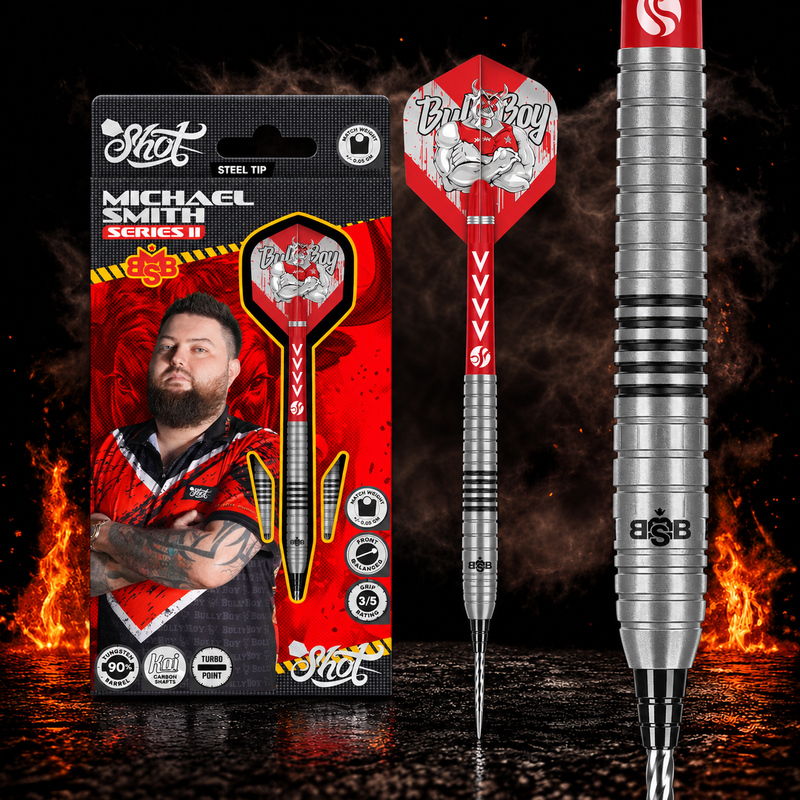 Shot Michael Smith Series II Turbo Point Steeldart 90% – Verpackung, senkrechter Dart und Barrel-Detail vor dunklem Rauchhintergrund
